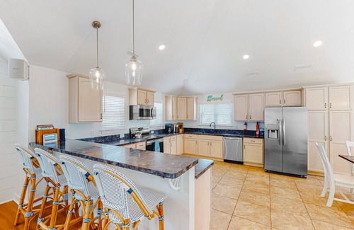 Sandbridge House | Renovated canal home with private pool, dock, roof deck, ocean/bay view, wet bar