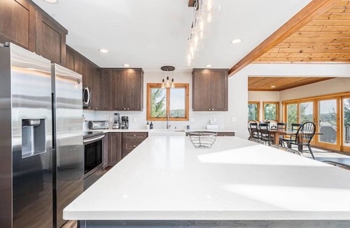 Waterfront Greens House | Renovated Home with great VIEWS! Boat dock, hot tub, dog friendly, golf course.