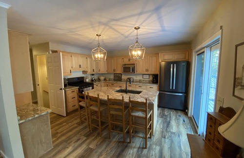 Lac du Flambeau House | Renovated House on Fence Lake for Families, Sunset View, Boat Dock, Snomo Access