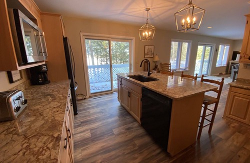 Lac du Flambeau House | Renovated House on Fence Lake for Families, Sunset View, Boat Dock, Snomo Access
