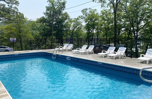 Camdenton Cabin | Renovated lakeside cabin with swimming pool & resort amenities!
