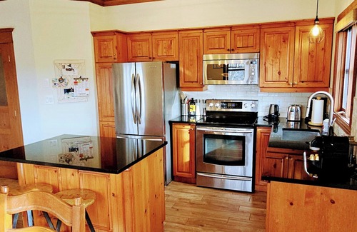 Mont-Tremblant Condo | RENOVATED- Ski in&out/Walk to village/Corner Unit/Heated pool/Sunny/Views/AC