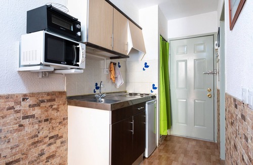 Los Cristianos Apartment | Renovated studio in Castle Harbour No. 125, with heated pool and wifi
