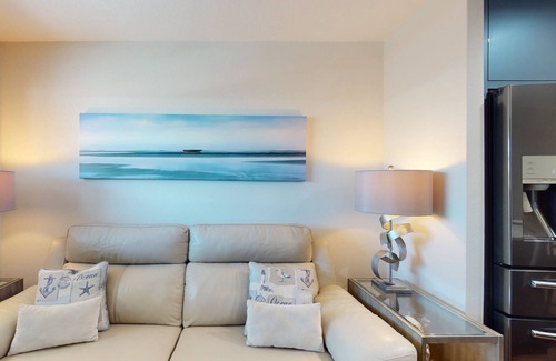 Sunset Beach Condo | Renovated Sunset Beach Waterfront Condo with Water Views, Pool, Fishing Dock & Beach Access.
