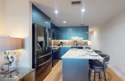 Sunset Beach Condo | Renovated Sunset Beach Waterfront Condo with Water Views, Pool, Fishing Dock & Beach Access.