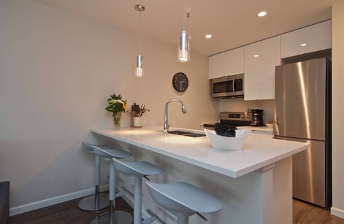 Village North Condo | Renovated, Village location. Walk to lifts and amenities, modern décor, Roof top hot tub in complex