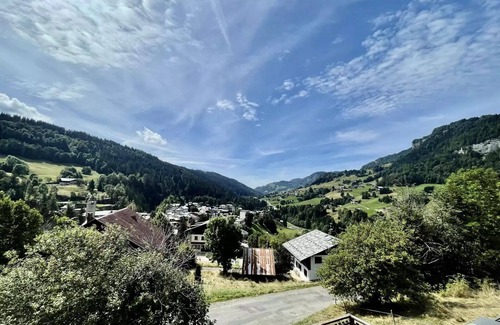 Flumet Ski Chalet | Residence Chez Simone - Chalet Simone overlooking a typical village in Val d'Arly