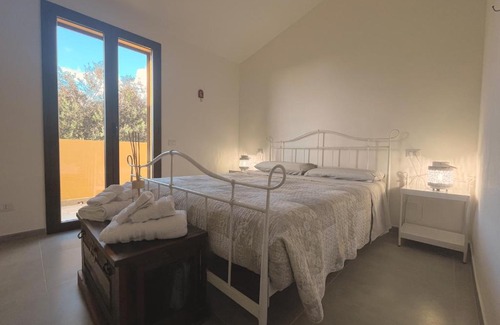 Sant'Anna Arresi House | Residence Oleandri- Oleandro Rosso