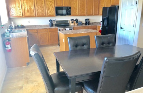Maricopa House | Resort Home with 2 Pools, Putting Green, Fire-Pit, Water Feature, & Pergola.