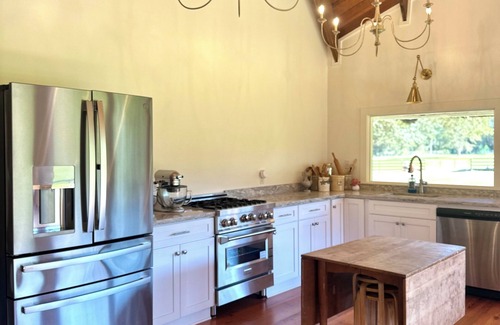 Carriere House | Restored Farmhouse with stocked pond for fishing