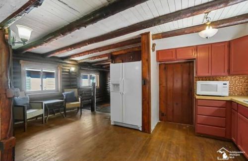 Luna Pier House | Restored historic log cabin & deck on Lake Erie