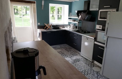 Marigny Cottage | Restored stone gite in the grounds of the chateau, rated 4 stars.