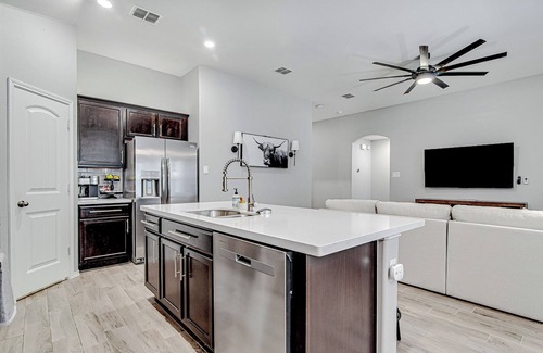 Haslet House | Rev Your Engines: Race to This Perfect Family Retreat!