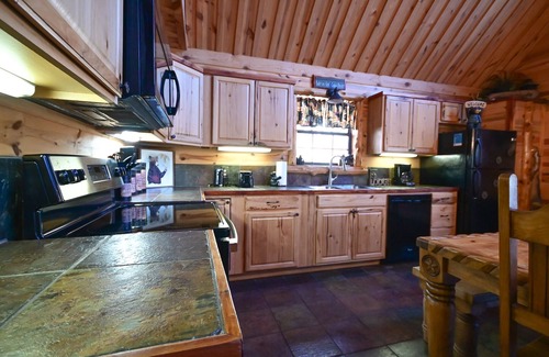 Board Camp Cabin | Ride to the trails from this secluded Luxury Cabin in Wolfpen Gap-Bear Mountain
