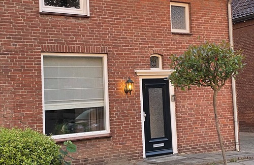 Udenhout House | Right in the center across from the stores