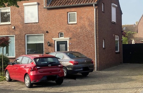 Udenhout House | Right in the center across from the stores