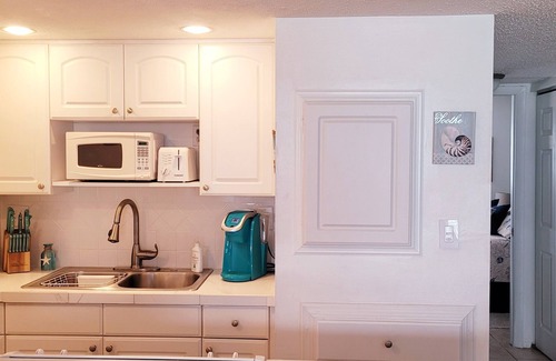 Sunset Beach Condo | Right on the Gulf! Beautiful white sandy beachfront! Safe, quiet, and friendly!