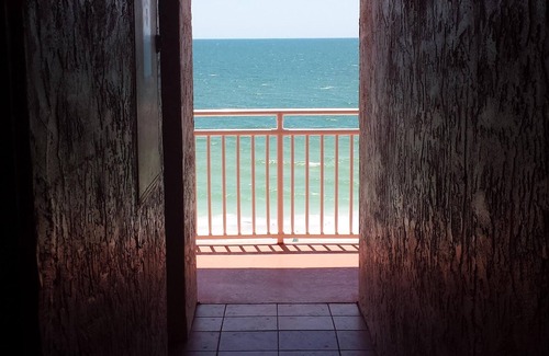 Sunset Beach Condo | Right on the Gulf! Beautiful white sandy beachfront! Safe, quiet, and friendly!
