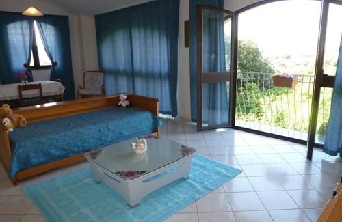 Iglesias Historic Centre Apartment | Rilassati nella Nostra Suite Angelica: Un Ambiente Familiare Vicino al Centro