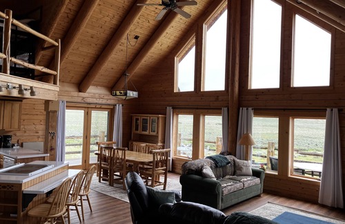 Clark House | River Frontage! Beautiful log home sitting on Yellowstone River with 360 views!