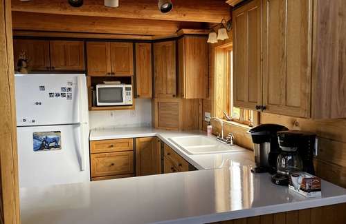 Clark House | River Frontage! Beautiful log home sitting on Yellowstone River with 360 views!
