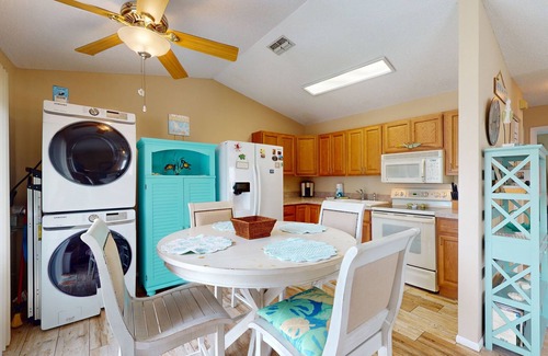 El Jobean House | River view home with pool, game tables, playground, scenic balcony, & W/D