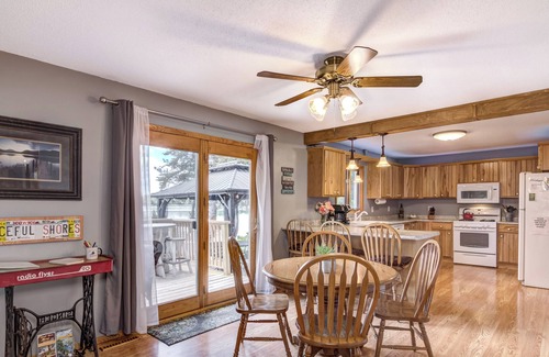 Amery House | Riverfront cabin with kayaks and canoes