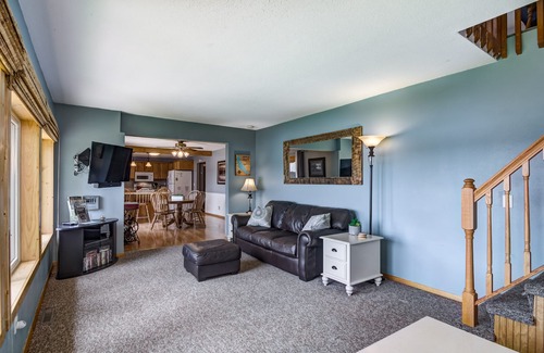 Amery House | Riverfront cabin with kayaks and canoes
