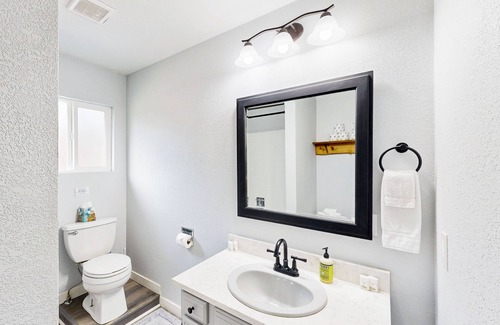 Post Falls House | Riverfront charmer with sunroom, gas grill, games, smart TVs, W/D, & partial AC