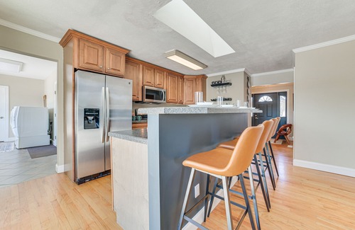 Cheboygan House | Riverfront Cheboygan Home w/Deck & Boat Dock!