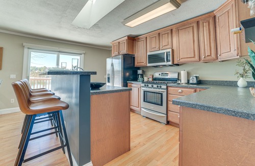 Cheboygan House | Riverfront Cheboygan Home w/Deck & Boat Dock!