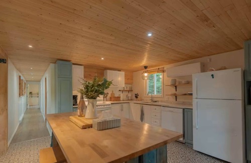 Brebeuf Ski Chalet | Riverfront Getaway with Hot Tub & Scenic Views