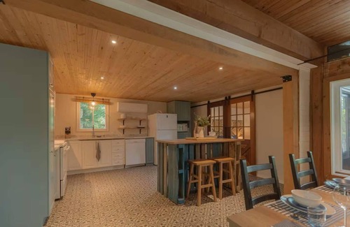 Brebeuf Ski Chalet | Riverfront Getaway with Hot Tub & Scenic Views