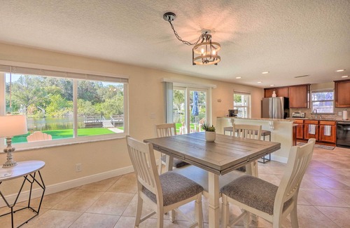 New Port Richey Cottage | Riverfront Home w/Putting Green & Boat Dock!