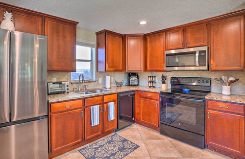 New Port Richey Cottage | Riverfront Home w/Putting Green & Boat Dock!