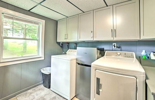 Cheboygan Cottage | Riverfront Home w/Dock ~ 6 Mi to Cheboygan!