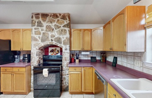 Seguin House | Riverfront retreat w/wraparound deck, gas grill, free WiFi, & central AC