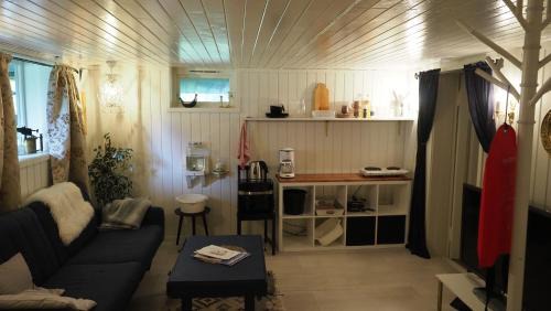 Vegarshei Apartment | Riverside Bliss - Apartment with Garden, WiFi and Nature Access