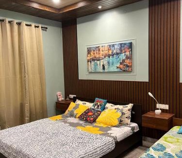 Sualkuchi Apartment | Riverside Palm Luxe 1BHK near Kamakhya & IHR