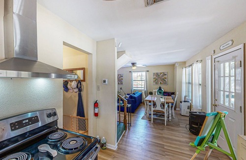 Bandera Cottage | Riverside Retreat with outside dining area, deck and internet