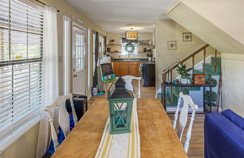 Bandera Cottage | Riverside Retreat with outside dining area, deck and internet