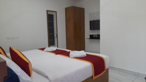 Thrippunithura Hotel | RKM Pearl Residency