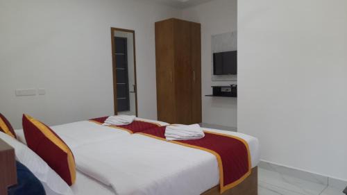 Thrippunithura Hotel | RKM Pearl Residency