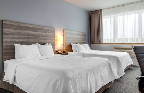 Amos Hotel | Rodeway Inn