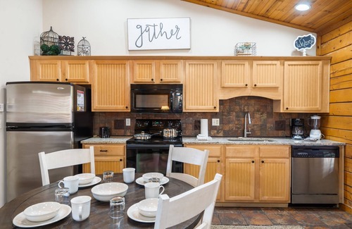 Branson Theater District Cabin | Romantic Studio Cabin with Fireplace & Wooded Deck