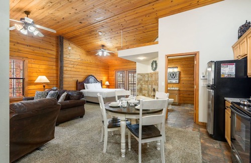 Branson Theater District Cabin | Romantic Studio Cabin with Fireplace & Wooded Deck
