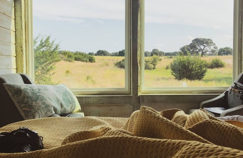 Dripping Springs Cottage | Romantic Treehouse Studio Suite overlooking the Texas Hill Country