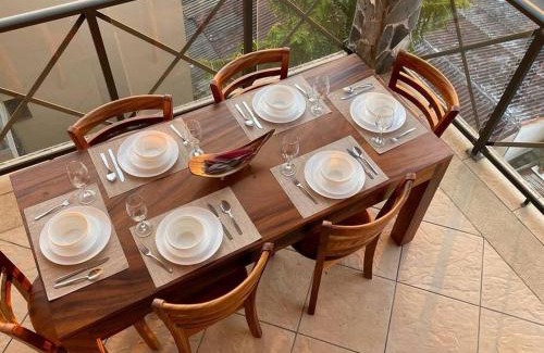 Barrio Los Villalobos House | Rooftop balcony oceanfront PH condo with King beds