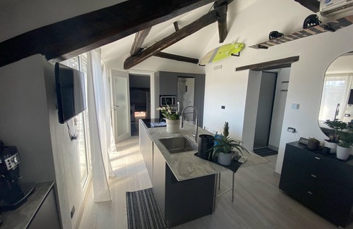 Como City Centre Apartment | Rooftop openspace with balconies, parking and bbq