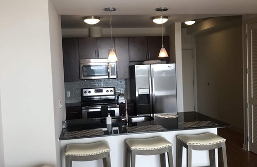 Central Business District Condo | Rooftop pool highrise views